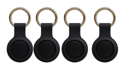 Four black Apple Find My smart tags with silicone keyring holders