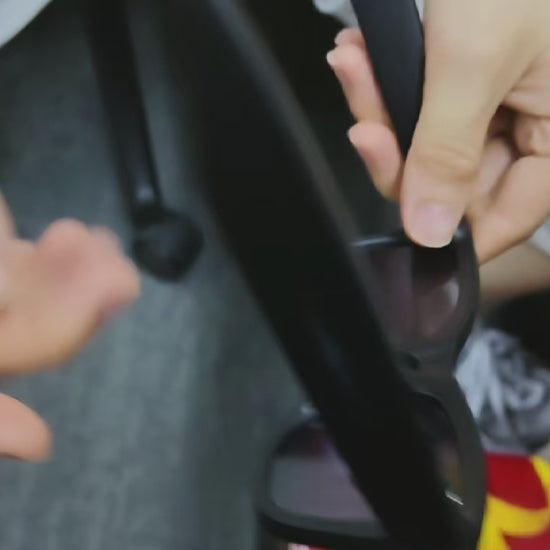 Supplier demonstration showing how to remove and refit lenses in black GS4 Max smart glasses.